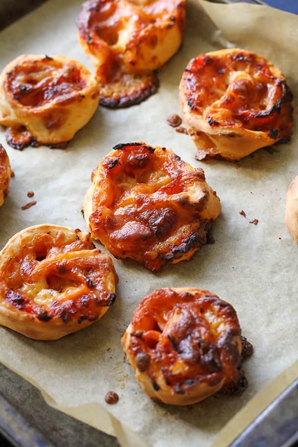 pizza scrolls on a baking tray.