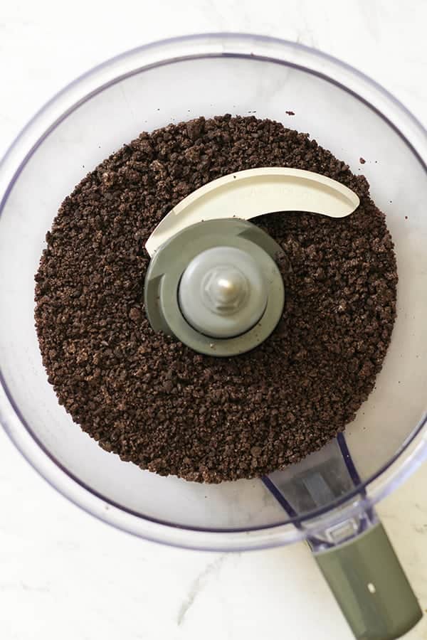 Oreo crumbs in a food processor.