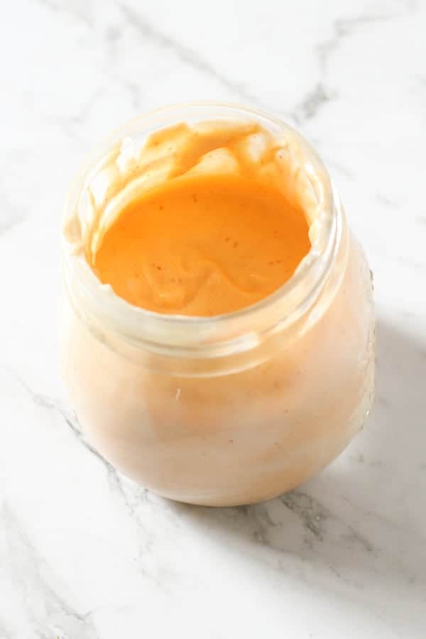 spicy mayonnaise in a glass jar.
