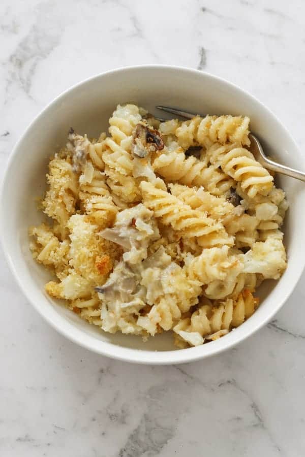 pasta bake in a white bowl.