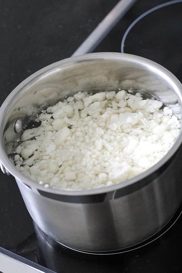 cauliflower in a saucepan of water.