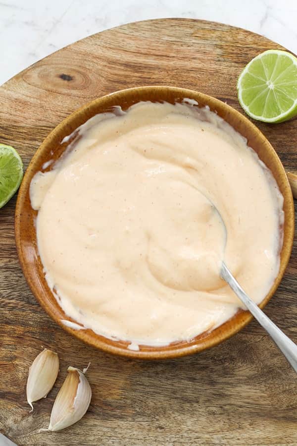 sriracha aioli in a brown bowl.
