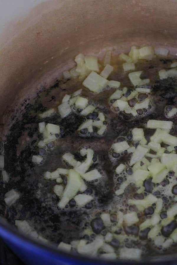 butter and onion in a dutch oven.