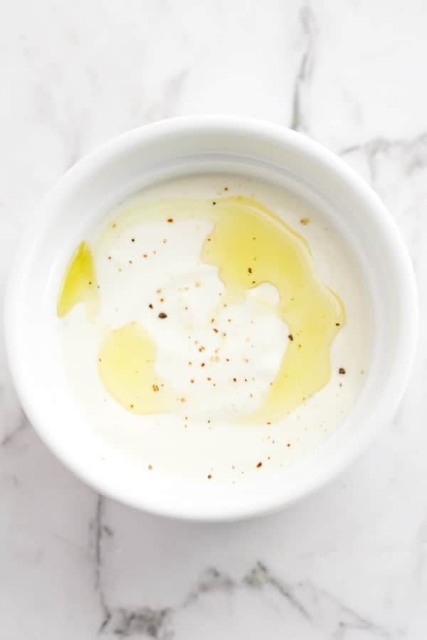 THE sauce in a white bowl