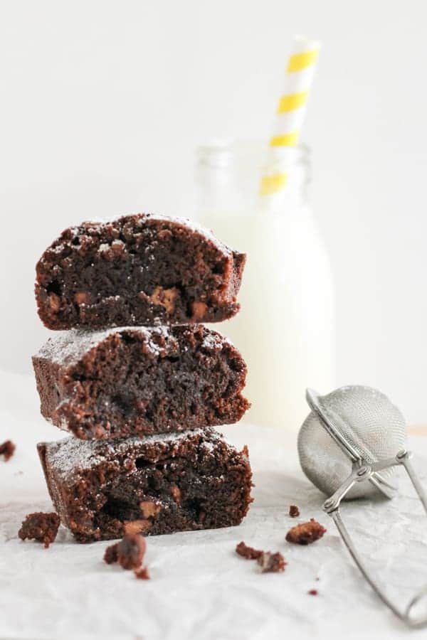 stack of air fryer brownies next to a bottle of milk.