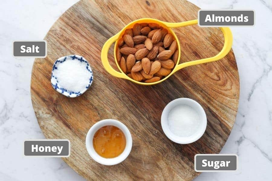 honey roasted almond ingredients on a wooden board.