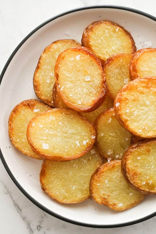 salt and vinegar potatoes on a white plate.