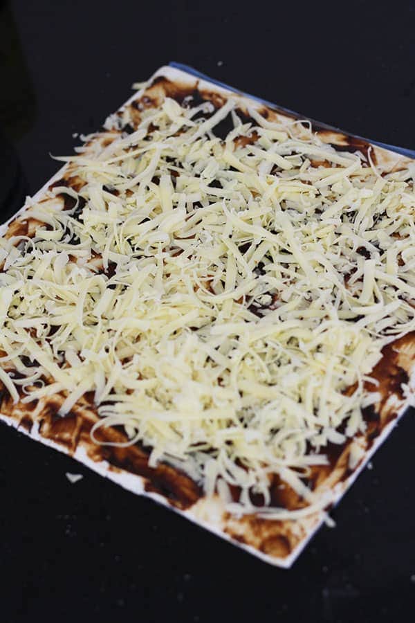 puff pastry sheet covered in cheese