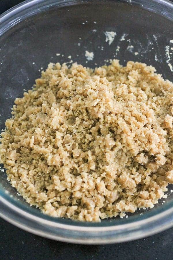 crumb mixture in a glass bowl.