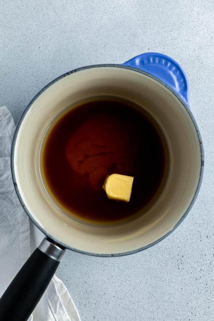 syrup being cooked in a saucepan.