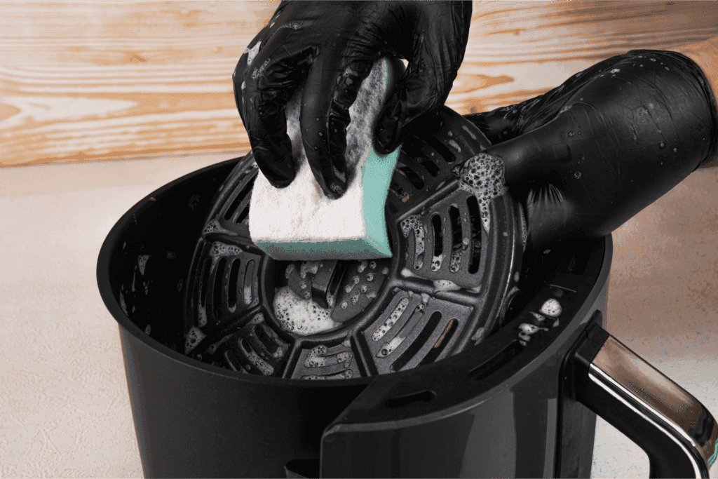 Scrub the air fryer tray