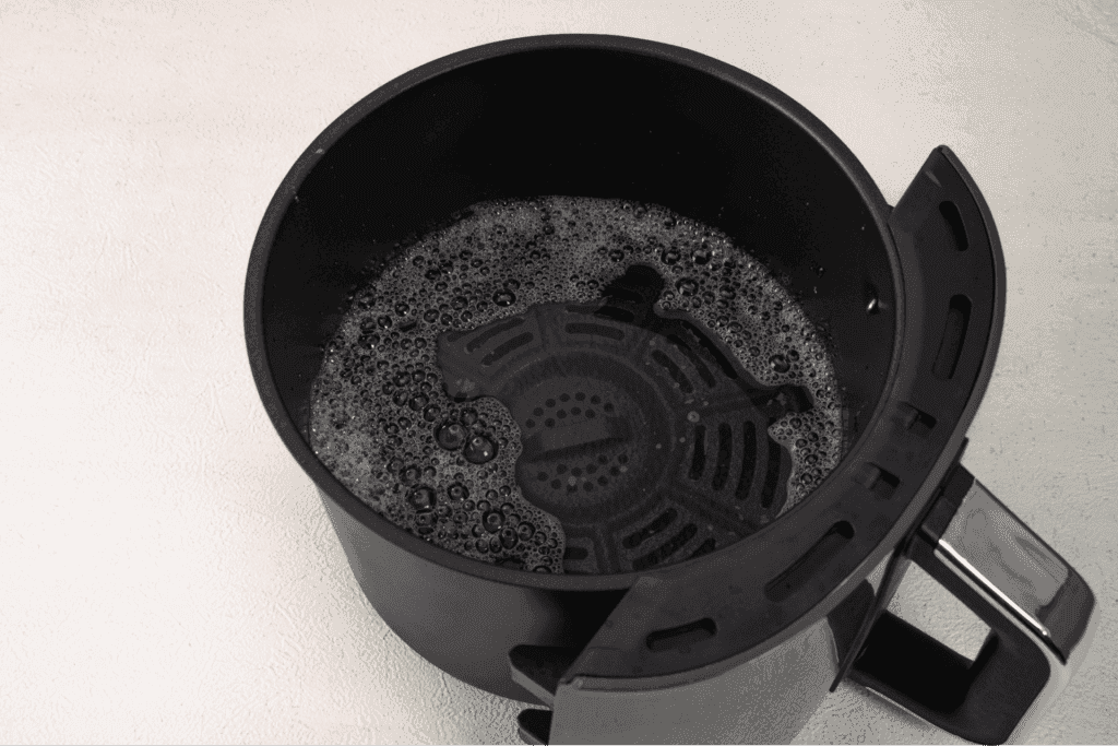 Soapy water in air fryer basket