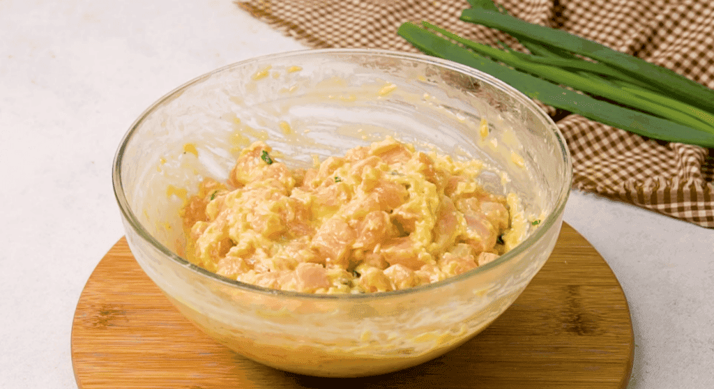 Chicken mixture in mixing bowl